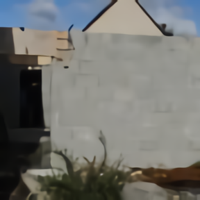 Extension en aglo façade arrière