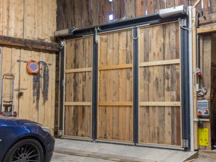 Porte de garage electrique pliante en bois