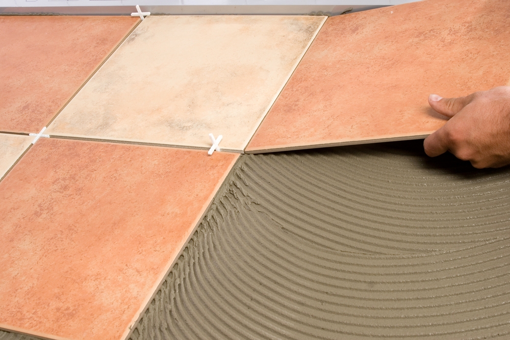 Pose carrelage beige et rose